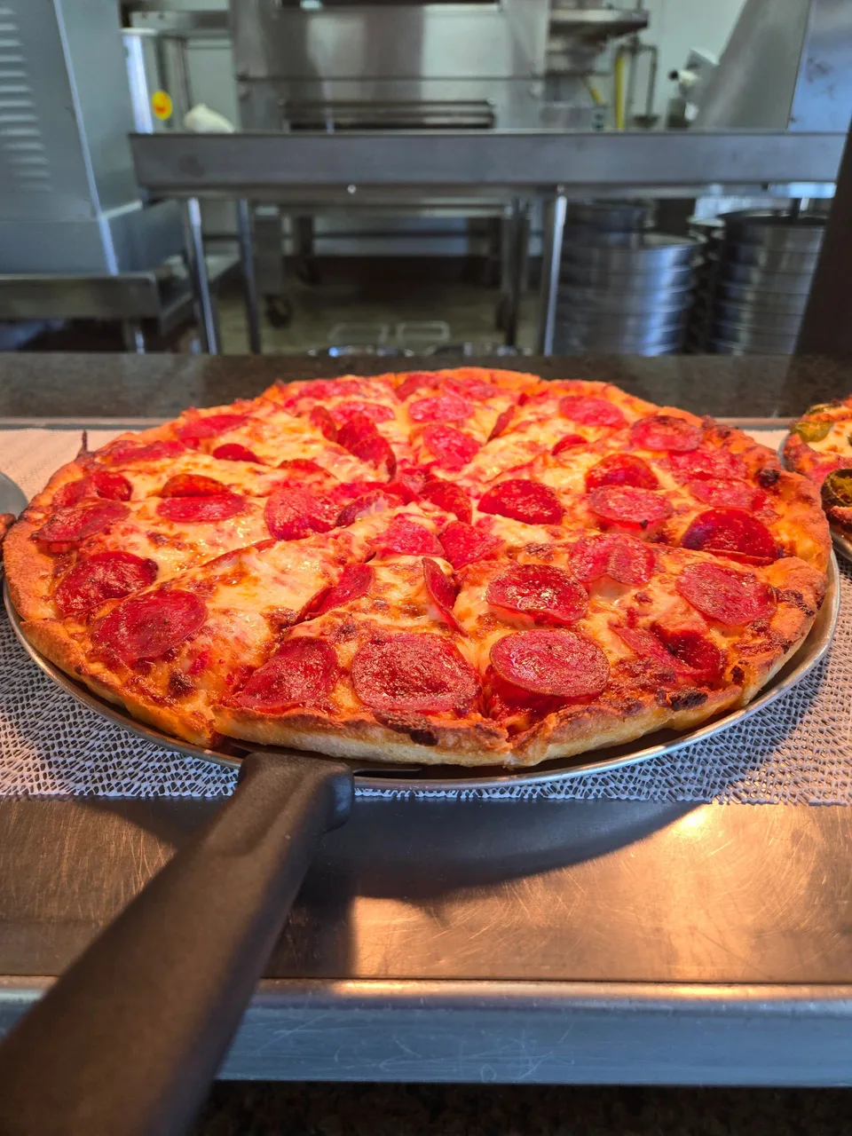 Pizza at Gulf Coast Pizza, photographed for its official website